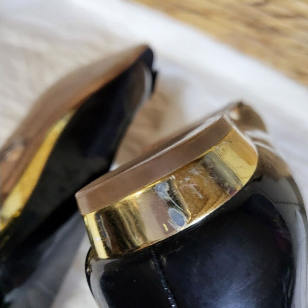 Tory Burch Black and Gold Loafers with Elegant Design